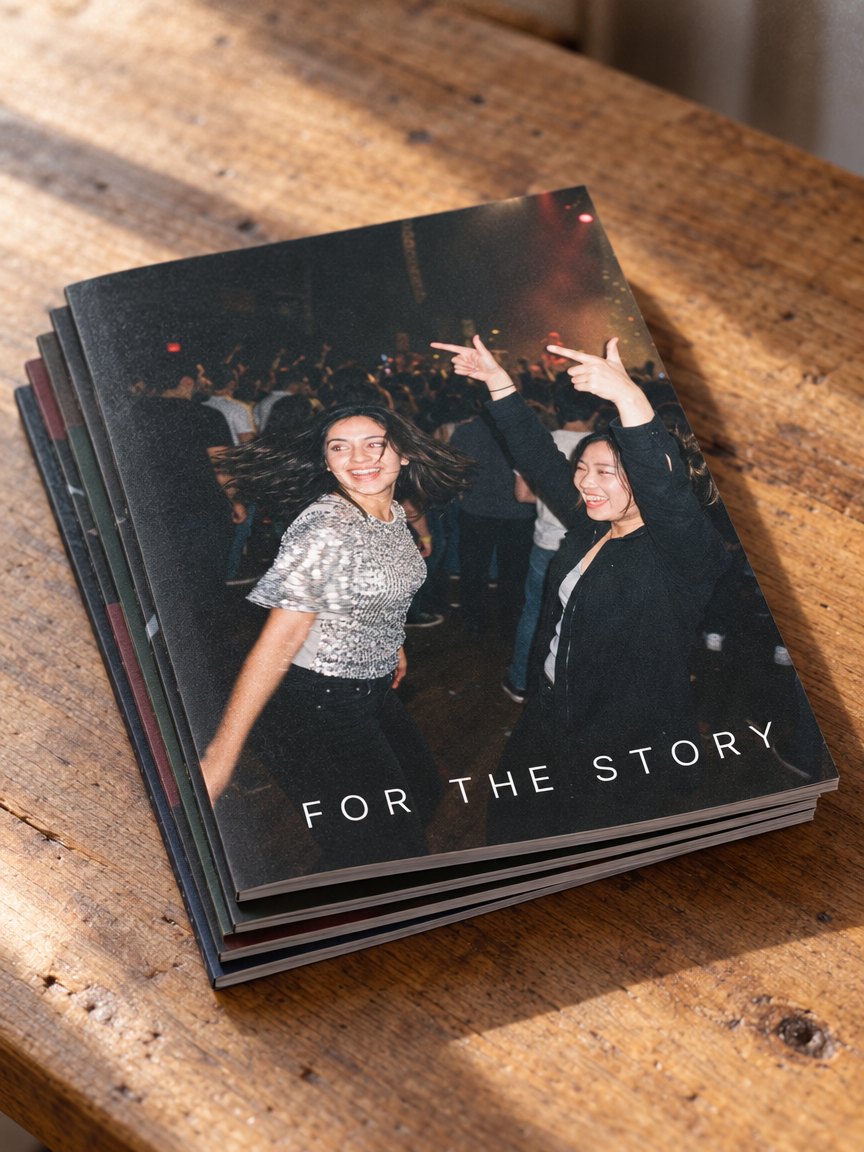 A stack of five printed zines, spines facing you